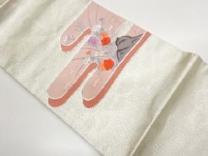 銀駒刺繍ヱ霞に笹・花々・岩模様名古屋帯